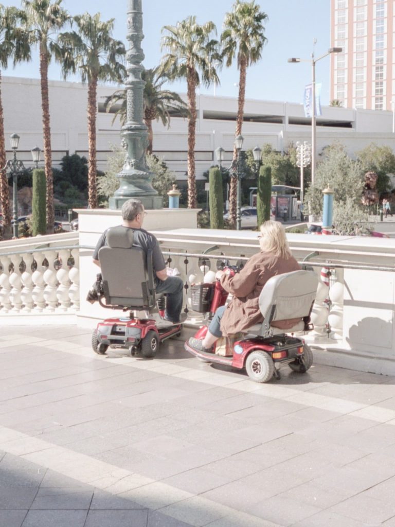 Couple On Mobility Scooters — Mobility Shop In Tweed Heads, NSW